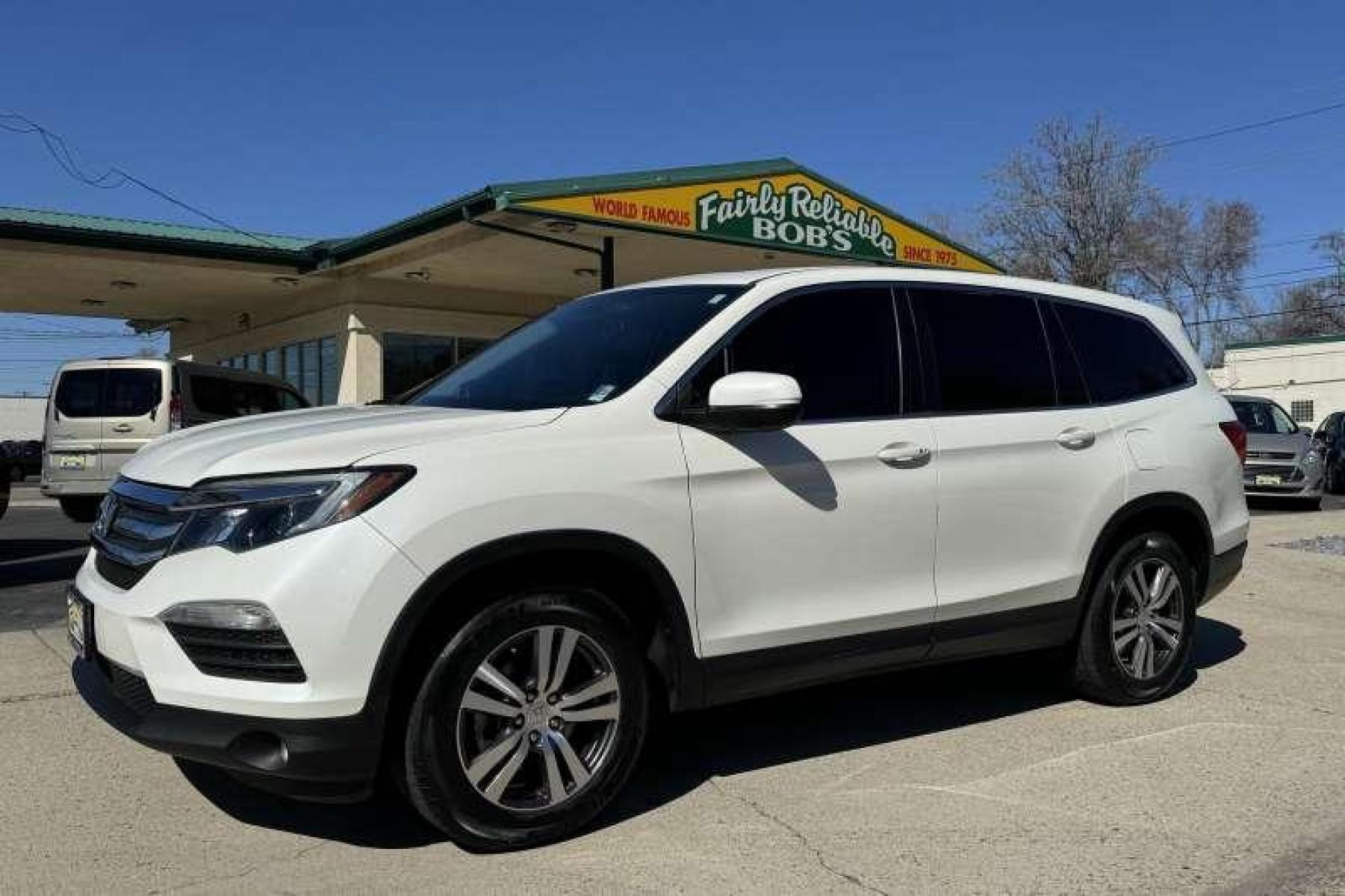 2017 White Diamond Pearl /Black Honda Pilot EX-L (5FNYF6H71HB) with an V6 3.5 Liter engine, Automatic transmission, located at 2304 W. Main St., Boise, ID, 83702, (208) 342-7777, 43.622105, -116.218658 - Amazing Condition! Hard To Find! Ready To Go! - Photo #0