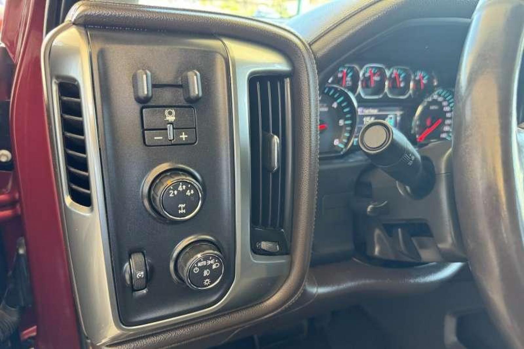 2015 Deep Ruby Metallic /Oak Chevrolet Silverado 2500 HD Crew Cab LTZ (1GC1KWEG2FF) with an V8 6.0 Liter engine, Automatic transmission, located at 2304 W. Main St., Boise, ID, 83702, (208) 342-7777, 43.622105, -116.218658 - New Wheels And Tires! Matching High Roof Shell! Well Maintained And Clean! - Photo #6