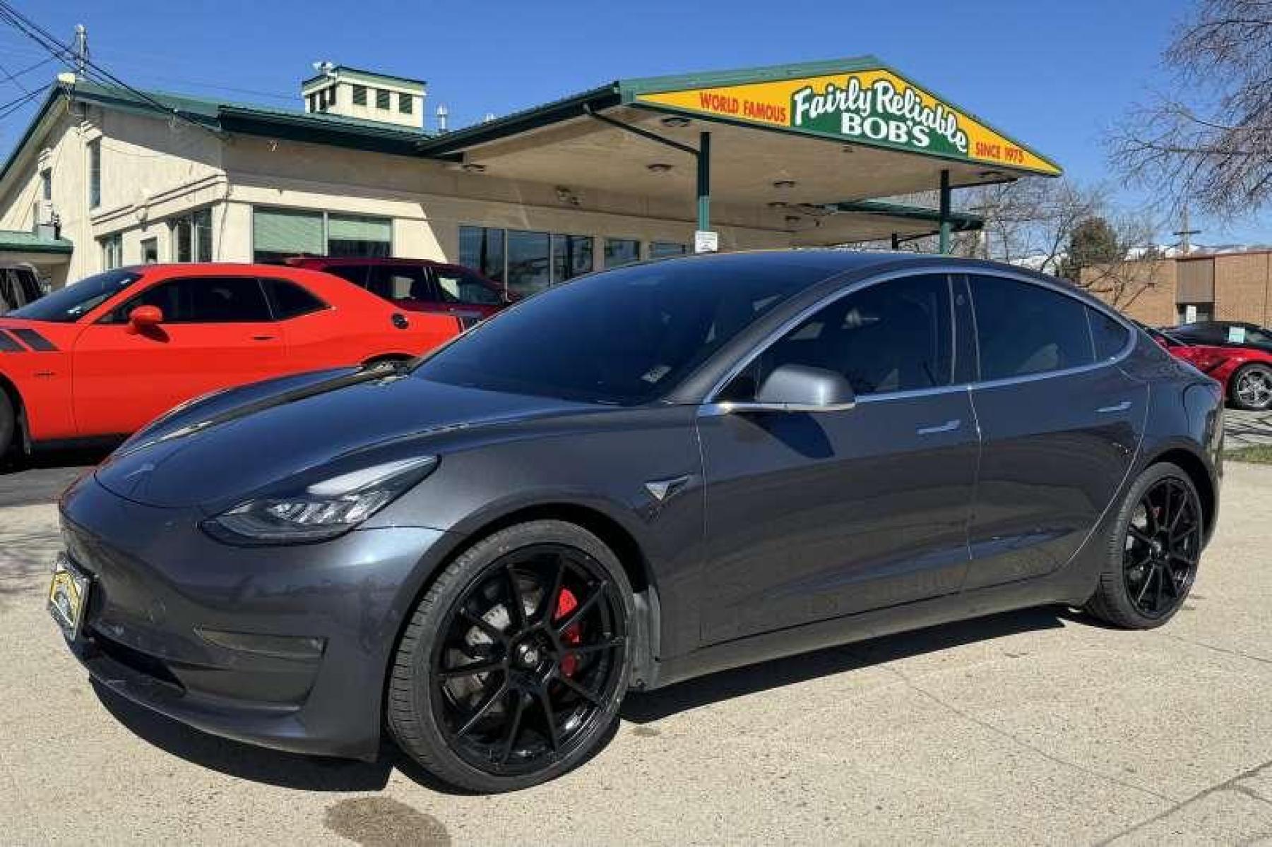 2018 Midnight Silver Metallic /White Tesla Model 3 Performance (5YJ3E1EB1JF) with an 75kWh engine, Automatic transmission, located at 2304 W. Main St., Boise, ID, 83702, (208) 342-7777, 43.622105, -116.218658 - Photo #0