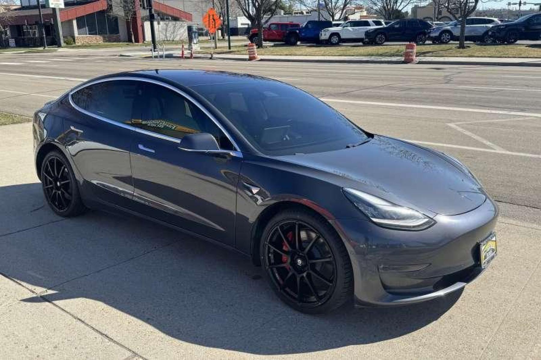 2018 Midnight Silver Metallic /White Tesla Model 3 Performance (5YJ3E1EB1JF) with an 75kWh engine, Automatic transmission, located at 2304 W. Main St., Boise, ID, 83702, (208) 342-7777, 43.622105, -116.218658 - New Wheels And Tires! Drives Awesome! Factory Rated 310 Mile Range! - Photo #2
