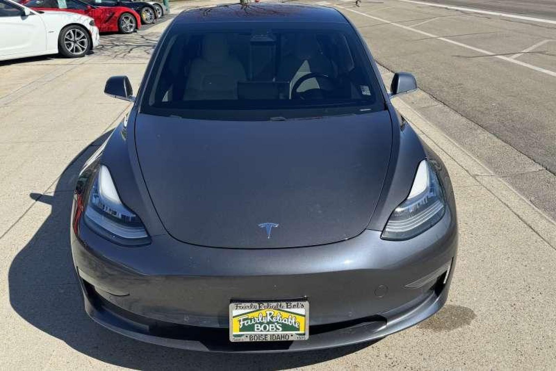 2018 Midnight Silver Metallic /White Tesla Model 3 Performance (5YJ3E1EB1JF) with an 75kWh engine, Automatic transmission, located at 2304 W. Main St., Boise, ID, 83702, (208) 342-7777, 43.622105, -116.218658 - Photo #3