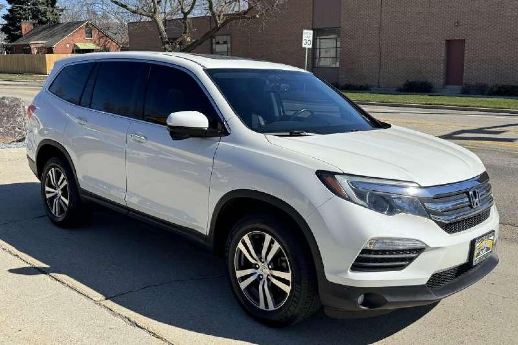 2017 White Diamond Pearl /Black Honda Pilot EX-L (5FNYF6H71HB) with an V6 3.5 Liter engine, Automatic transmission, located at 2304 W. Main St., Boise, ID, 83702, (208) 342-7777, 43.622105, -116.218658 - Amazing Condition! Hard To Find! Ready To Go! - Photo #2