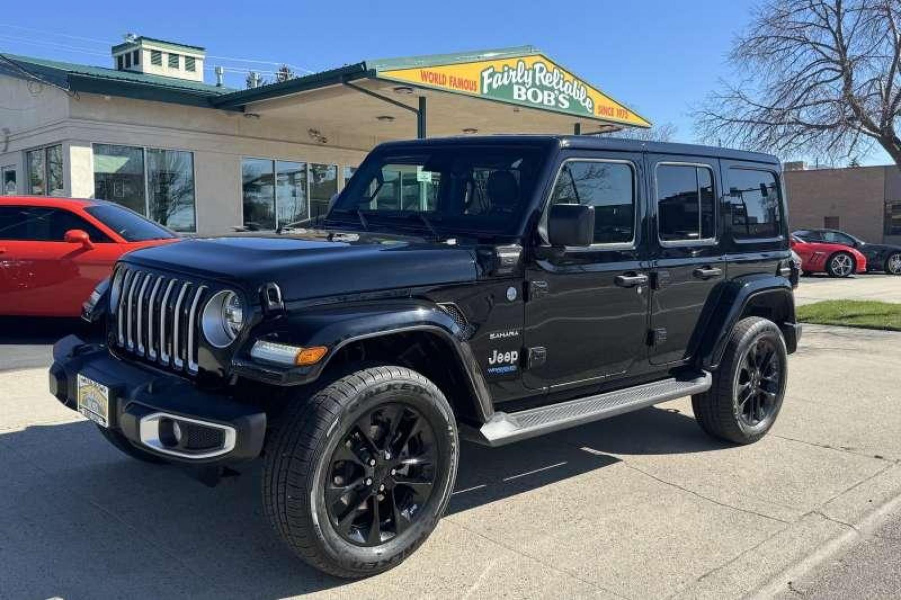 2021 Black /Black Jeep Wrangler Unlimited 4xe Sahara (1C4JJXP62MW) with an 4 Cyl 2.0 Liter Hybrid engine, Automatic transmission, located at 2304 W. Main St., Boise, ID, 83702, (208) 342-7777, 43.622105, -116.218658 - Photo #0