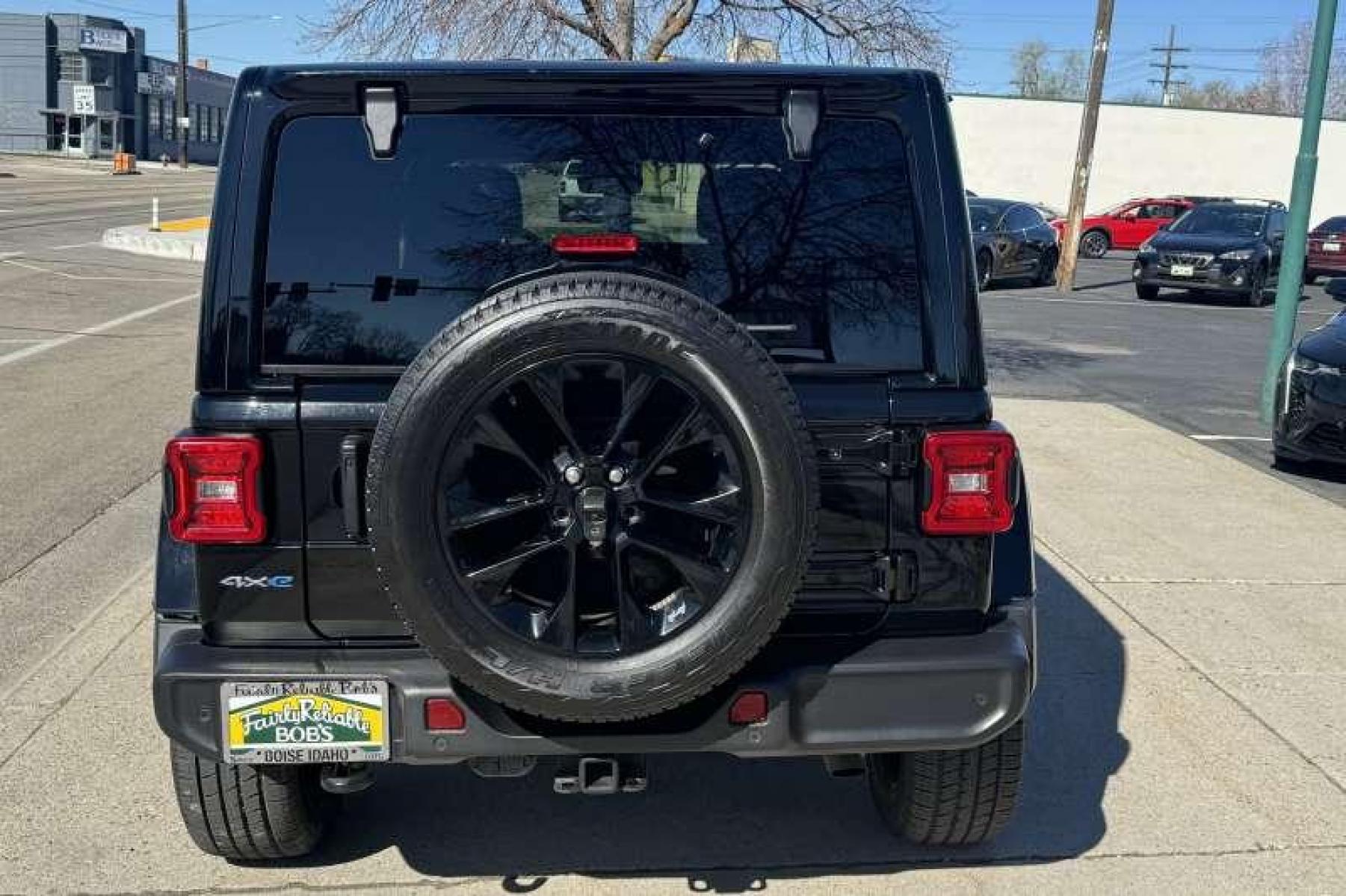 2021 Black /Black Jeep Wrangler Unlimited 4xe Sahara (1C4JJXP62MW) with an 4 Cyl 2.0 Liter Hybrid engine, Automatic transmission, located at 2304 W. Main St., Boise, ID, 83702, (208) 342-7777, 43.622105, -116.218658 - Ready For Fun In The Sun Or Cold Weather. This Is Your Jeep! One Owner With Remaining Factory Powertrain Warranty! - Photo #1