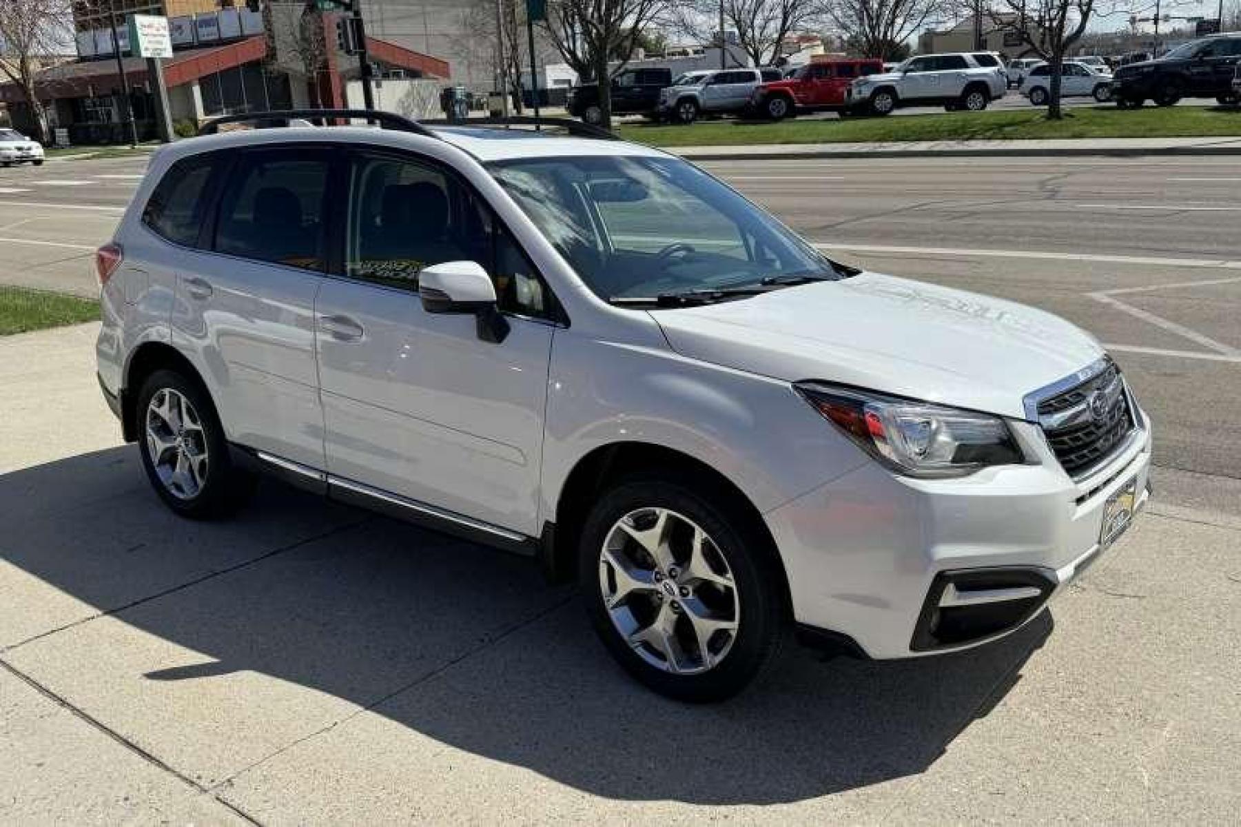 2017 White /Tobacco Subaru Forester Touring (JF2SJAWC7HH) with an H4 2.5 Liter engine, Automatic transmission, located at 2304 W. Main St., Boise, ID, 83702, (208) 342-7777, 43.622105, -116.218658 - Low Mileage And Highly Optioned! Loaded With Safety Features! - Photo #2