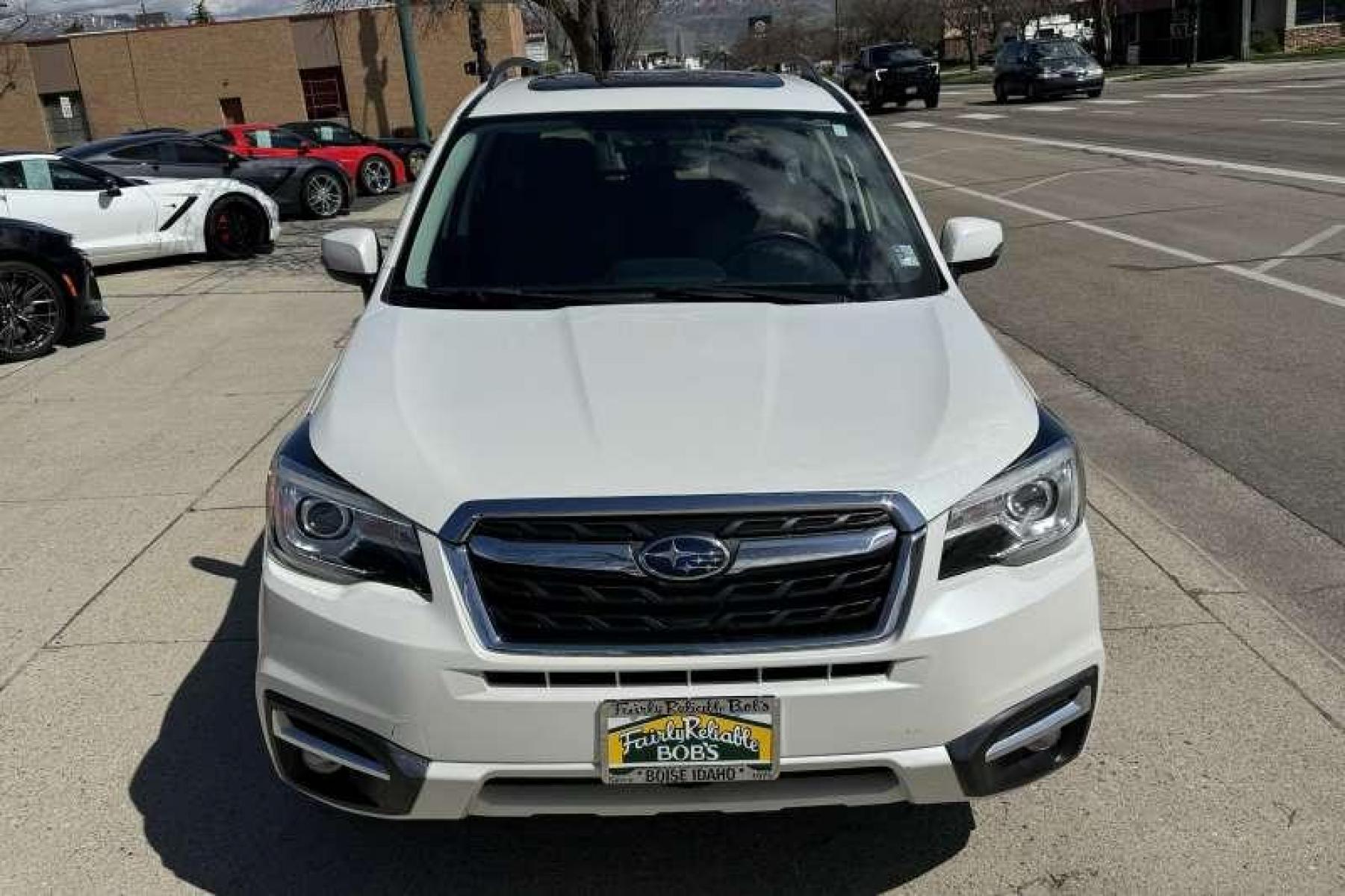 2017 White /Tobacco Subaru Forester Touring (JF2SJAWC7HH) with an H4 2.5 Liter engine, Automatic transmission, located at 2304 W. Main St., Boise, ID, 83702, (208) 342-7777, 43.622105, -116.218658 - Low Mileage And Highly Optioned! Loaded With Safety Features! - Photo #3