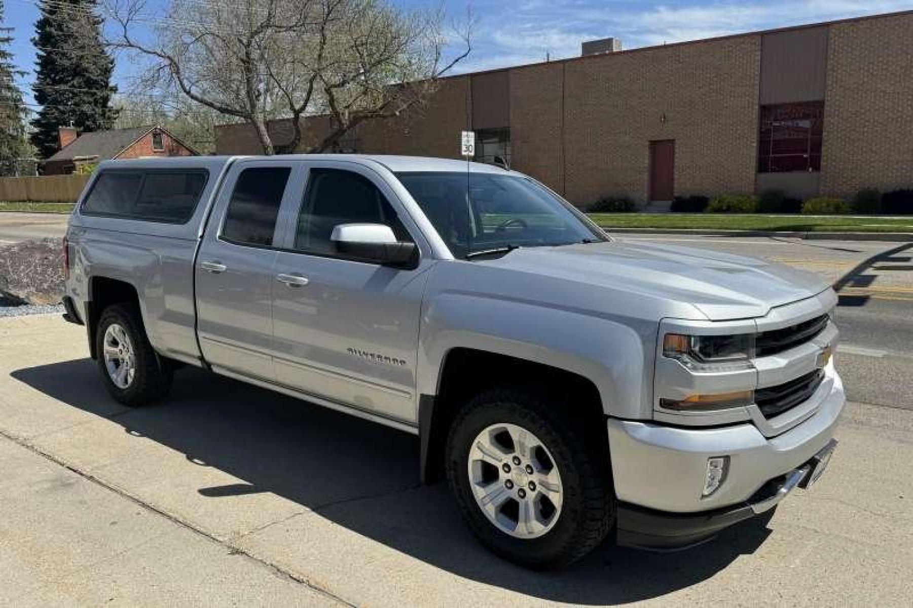 2016 Silver /Black Chevrolet Silverado 1500 Double Cab LT (1GCVKREC2GZ) with an V8 5.3 Liter engine, Automatic transmission, located at 2304 W. Main St., Boise, ID, 83702, (208) 342-7777, 43.622105, -116.218658 - New Tires! Matching Shell! Ready To Go! - Photo #2
