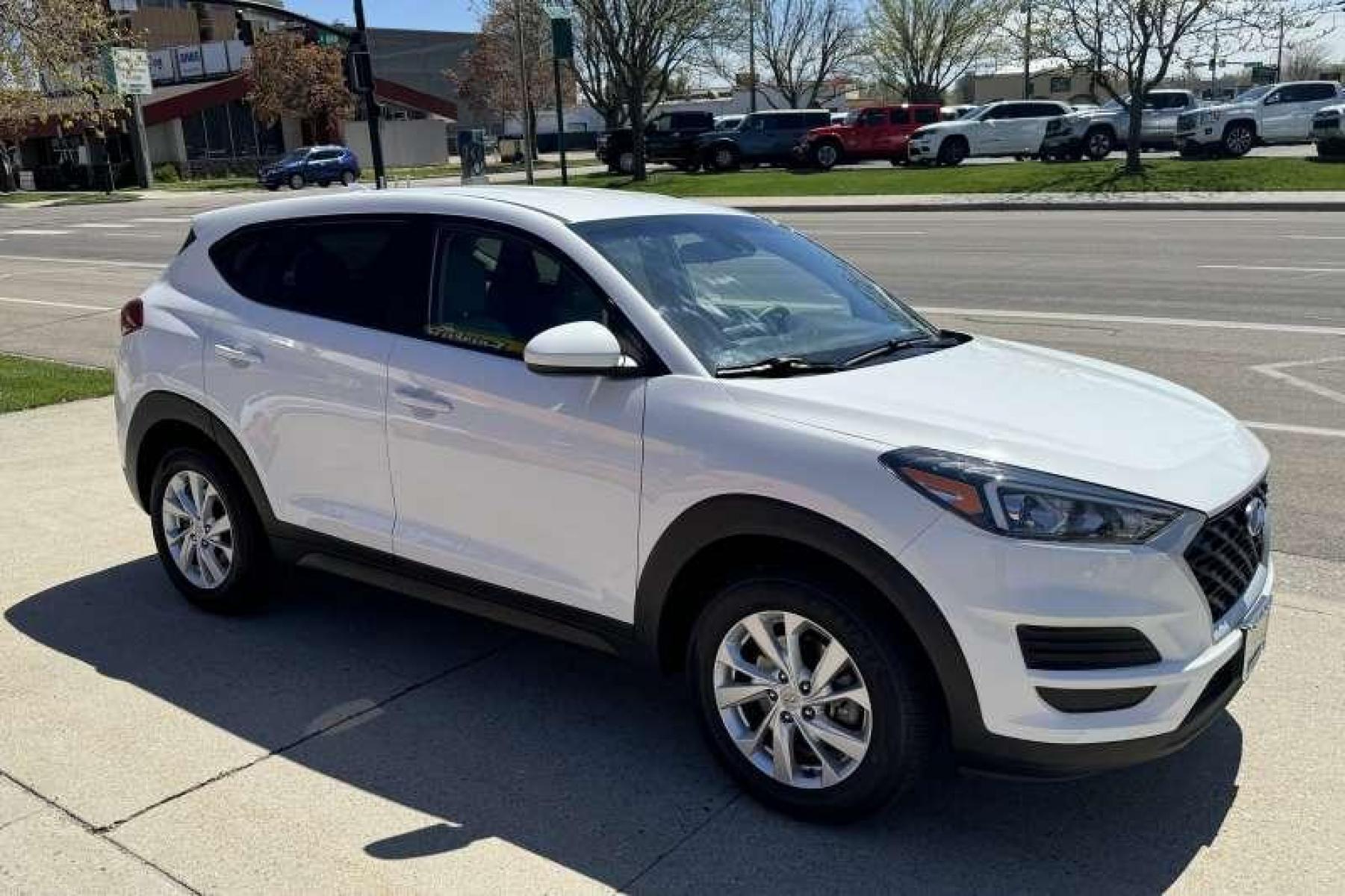 2020 White /Gray Hyundai Tucson SE AWD (KM8J2CA46LU) with an 4 Cyl 2.0 Liter engine, Automatic transmission, located at 2304 W. Main St., Boise, ID, 83702, (208) 342-7777, 43.622105, -116.218658 - All Wheel Drive! New Tires! Remaining Factory Powertrain Warranty! - Photo #2